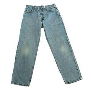 Vintage Levi's 550 Relaxed Fit Light Blue Wash Denim Jeans 33x31 Made In USA